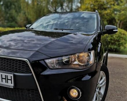 Черный Мицубиси Аутлендер ХЛ, объемом двигателя 2.2 л и пробегом 228 тыс. км за 10150 $, фото 4 на Automoto.ua