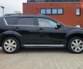 Мицубиси Аутлендер ХЛ 2010 в Днепре (Днепропетровске) на Automoto.ua Черный Мицубиси Аутлендер ХЛ, объемом двигателя 2.3 л и пробегом 193 тыс. км за 14999 $, фото 3 на Automoto.ua