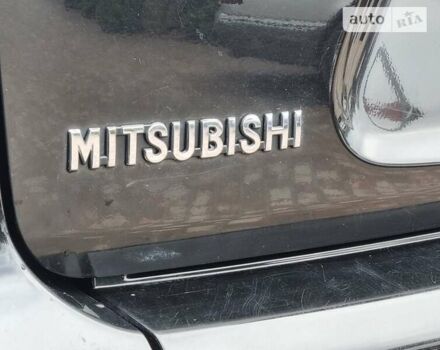 Чорний Міцубісі Аутлендер ХЛ, об'ємом двигуна 2 л та пробігом 186 тис. км за 10600 $, фото 64 на Automoto.ua