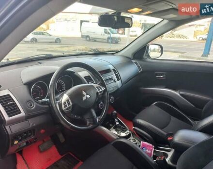 Черный Мицубиси Аутлендер ХЛ, объемом двигателя 2.2 л и пробегом 232 тыс. км за 11600 $, фото 1354 на Automoto.ua