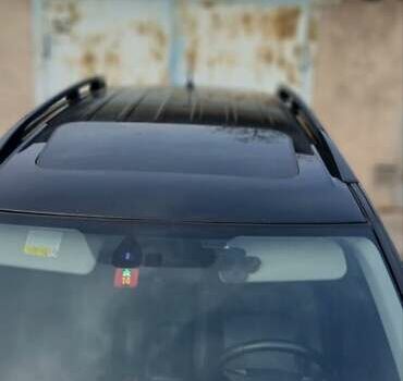 Черный Мицубиси Аутлендер ХЛ, объемом двигателя 2.3 л и пробегом 190 тыс. км за 12500 $, фото 1 на Automoto.ua