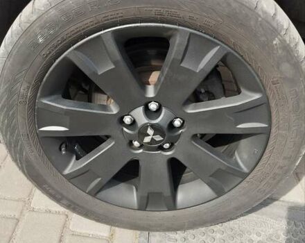 Черный Мицубиси Аутлендер ХЛ, объемом двигателя 2.18 л и пробегом 253 тыс. км за 12500 $, фото 2 на Automoto.ua