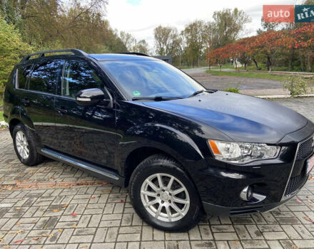 Черный Мицубиси Аутлендер ХЛ, объемом двигателя 2.2 л и пробегом 138 тыс. км за 12250 $, фото 4 на Automoto.ua