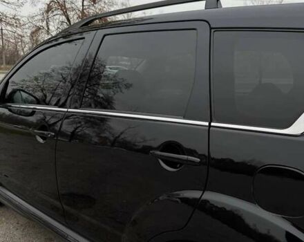 Черный Мицубиси Аутлендер ХЛ, объемом двигателя 2.18 л и пробегом 253 тыс. км за 12500 $, фото 4 на Automoto.ua