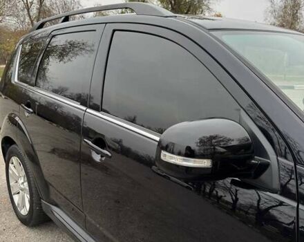 Черный Мицубиси Аутлендер ХЛ, объемом двигателя 2.18 л и пробегом 253 тыс. км за 12500 $, фото 13 на Automoto.ua