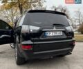 Черный Мицубиси Аутлендер ХЛ, объемом двигателя 2.18 л и пробегом 253 тыс. км за 12500 $, фото 22 на Automoto.ua