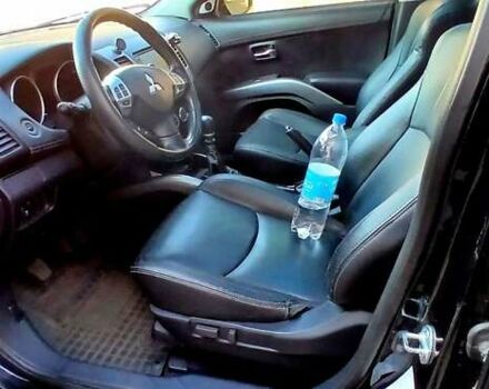 Черный Мицубиси Аутлендер ХЛ, объемом двигателя 2.3 л и пробегом 190 тыс. км за 12500 $, фото 15 на Automoto.ua