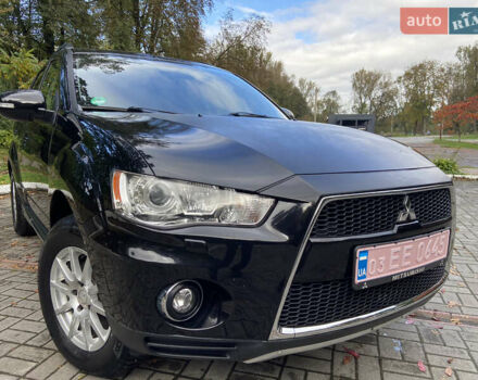 Черный Мицубиси Аутлендер ХЛ, объемом двигателя 2.2 л и пробегом 138 тыс. км за 12250 $, фото 1 на Automoto.ua