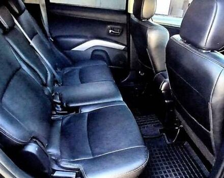 Черный Мицубиси Аутлендер ХЛ, объемом двигателя 2.3 л и пробегом 190 тыс. км за 12500 $, фото 16 на Automoto.ua