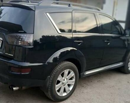 Черный Мицубиси Аутлендер ХЛ, объемом двигателя 2.3 л и пробегом 190 тыс. км за 12500 $, фото 3 на Automoto.ua