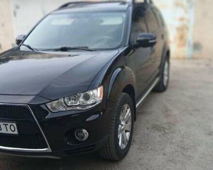 Черный Мицубиси Аутлендер ХЛ, объемом двигателя 2.3 л и пробегом 190 тыс. км за 12500 $, фото 6 на Automoto.ua