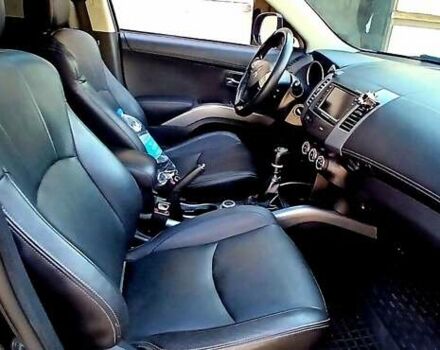 Черный Мицубиси Аутлендер ХЛ, объемом двигателя 2.3 л и пробегом 190 тыс. км за 12500 $, фото 12 на Automoto.ua