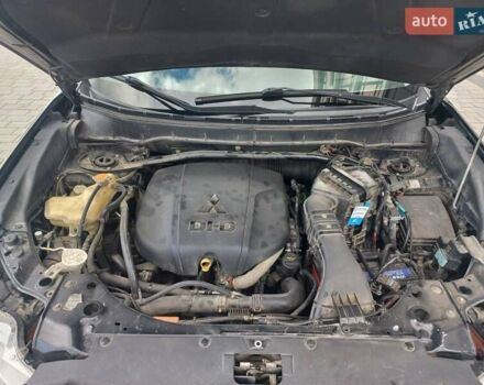 Черный Мицубиси Аутлендер ХЛ, объемом двигателя 2.2 л и пробегом 232 тыс. км за 11600 $, фото 419 на Automoto.ua