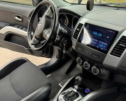 Черный Мицубиси Аутлендер ХЛ, объемом двигателя 2.18 л и пробегом 253 тыс. км за 12500 $, фото 18 на Automoto.ua