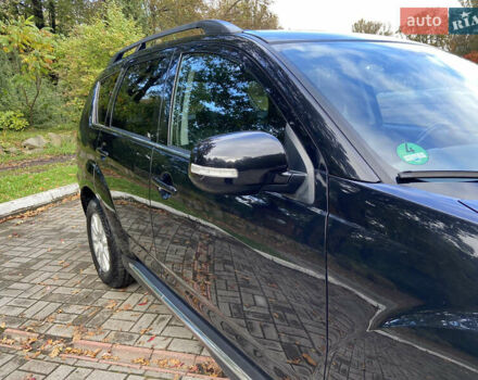 Черный Мицубиси Аутлендер ХЛ, объемом двигателя 2.2 л и пробегом 138 тыс. км за 12250 $, фото 3 на Automoto.ua