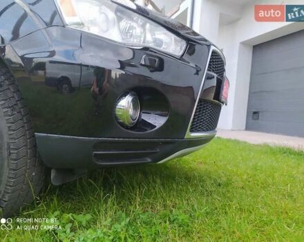 Черный Мицубиси Аутлендер ХЛ, объемом двигателя 2.2 л и пробегом 270 тыс. км за 12000 $, фото 14 на Automoto.ua