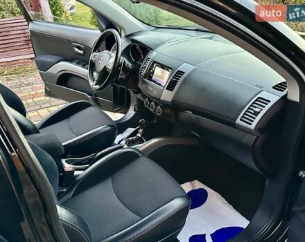 Черный Мицубиси Аутлендер ХЛ, объемом двигателя 2.2 л и пробегом 232 тыс. км за 11700 $, фото 23 на Automoto.ua