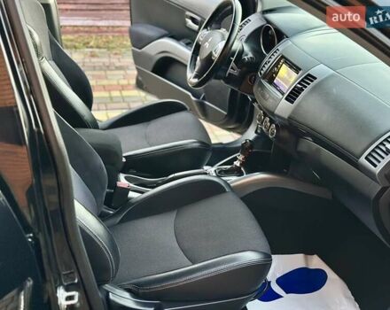 Черный Мицубиси Аутлендер ХЛ, объемом двигателя 2.2 л и пробегом 232 тыс. км за 11700 $, фото 21 на Automoto.ua