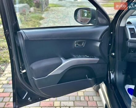 Черный Мицубиси Аутлендер ХЛ, объемом двигателя 2.2 л и пробегом 232 тыс. км за 11700 $, фото 11 на Automoto.ua