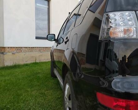 Черный Мицубиси Аутлендер ХЛ, объемом двигателя 2.2 л и пробегом 270 тыс. км за 12000 $, фото 9 на Automoto.ua