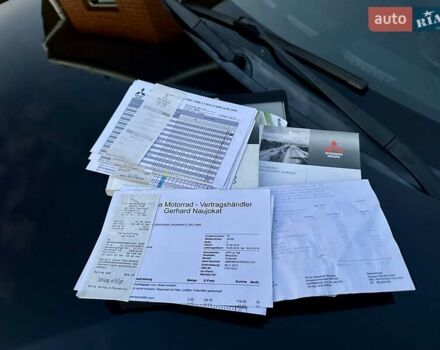 Черный Мицубиси Аутлендер ХЛ, объемом двигателя 2.2 л и пробегом 232 тыс. км за 11700 $, фото 48 на Automoto.ua