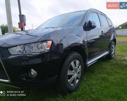 Черный Мицубиси Аутлендер ХЛ, объемом двигателя 2.2 л и пробегом 270 тыс. км за 12000 $, фото 1 на Automoto.ua