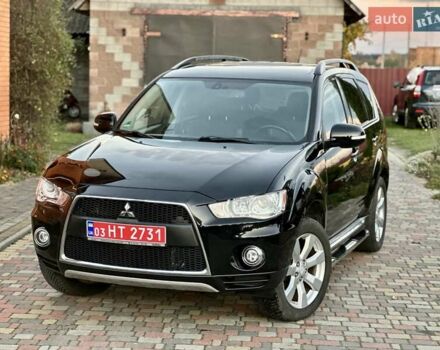 Черный Мицубиси Аутлендер ХЛ, объемом двигателя 2.2 л и пробегом 232 тыс. км за 11700 $, фото 2 на Automoto.ua