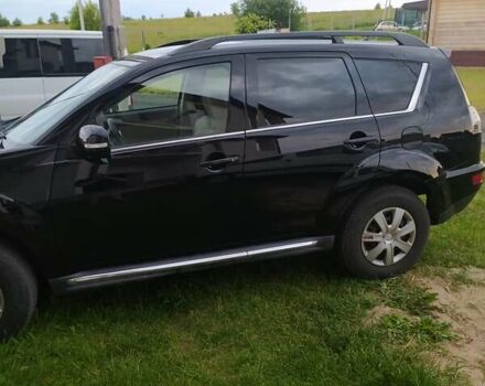 Черный Мицубиси Аутлендер ХЛ, объемом двигателя 2.2 л и пробегом 270 тыс. км за 12000 $, фото 7 на Automoto.ua