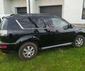 Черный Мицубиси Аутлендер ХЛ, объемом двигателя 2.2 л и пробегом 270 тыс. км за 12000 $, фото 6 на Automoto.ua