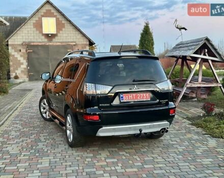 Черный Мицубиси Аутлендер ХЛ, объемом двигателя 2.2 л и пробегом 232 тыс. км за 11700 $, фото 4 на Automoto.ua