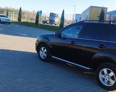 Чорний Міцубісі Аутлендер ХЛ, об'ємом двигуна 2.2 л та пробігом 230 тис. км за 12300 $, фото 1 на Automoto.ua