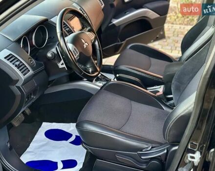 Черный Мицубиси Аутлендер ХЛ, объемом двигателя 2.2 л и пробегом 232 тыс. км за 11700 $, фото 13 на Automoto.ua