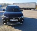 Чорний Міцубісі Аутлендер ХЛ, об'ємом двигуна 2.2 л та пробігом 230 тис. км за 12300 $, фото 1 на Automoto.ua
