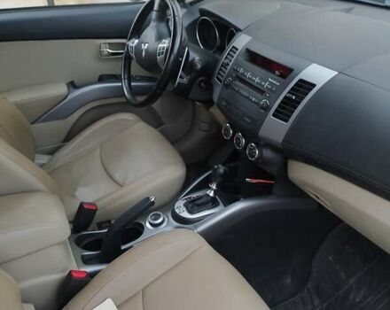 Черный Мицубиси Аутлендер ХЛ, объемом двигателя 2.2 л и пробегом 270 тыс. км за 12000 $, фото 24 на Automoto.ua