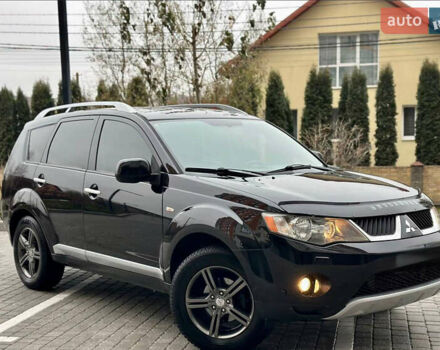Чорний Міцубісі Аутлендер ХЛ, об'ємом двигуна 2 л та пробігом 222 тис. км за 10300 $, фото 1 на Automoto.ua
