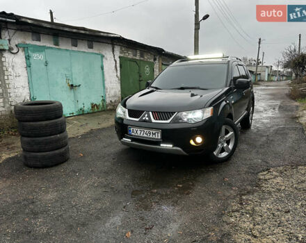 Чорний Міцубісі Аутлендер ХЛ, об'ємом двигуна 2.4 л та пробігом 283 тис. км за 8900 $, фото 1 на Automoto.ua