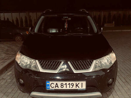 Черный Мицубиси Аутлендер ХЛ, объемом двигателя 3 л и пробегом 253 тыс. км за 9800 $, фото 1 на Automoto.ua