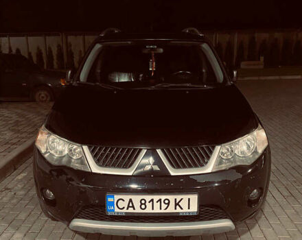 Черный Мицубиси Аутлендер ХЛ, объемом двигателя 3 л и пробегом 253 тыс. км за 9800 $, фото 1 на Automoto.ua