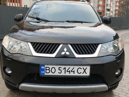 Черный Мицубиси Аутлендер ХЛ, объемом двигателя 3 л и пробегом 207 тыс. км за 9300 $, фото 1 на Automoto.ua