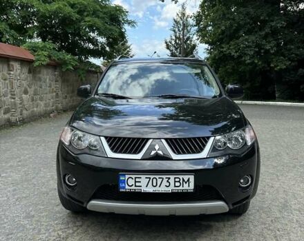 Чорний Міцубісі Аутлендер ХЛ, об'ємом двигуна 3 л та пробігом 264 тис. км за 9500 $, фото 1 на Automoto.ua