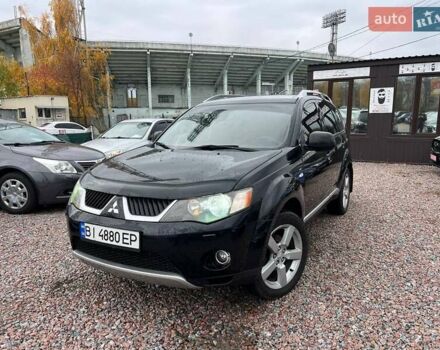 Черный Мицубиси Аутлендер ХЛ, объемом двигателя 3 л и пробегом 245 тыс. км за 9300 $, фото 1 на Automoto.ua
