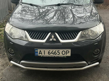 Чорний Міцубісі Аутлендер ХЛ, об'ємом двигуна 3 л та пробігом 169 тис. км за 9300 $, фото 1 на Automoto.ua