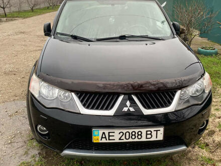 Черный Мицубиси Аутлендер ХЛ, объемом двигателя 3 л и пробегом 256 тыс. км за 9500 $, фото 1 на Automoto.ua