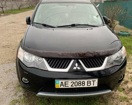 Черный Мицубиси Аутлендер ХЛ, объемом двигателя 3 л и пробегом 256 тыс. км за 9500 $, фото 1 на Automoto.ua