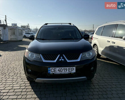 Чорний Міцубісі Аутлендер ХЛ, об'ємом двигуна 2 л та пробігом 264 тис. км за 7950 $, фото 1 на Automoto.ua