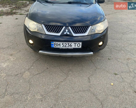 Черный Мицубиси Аутлендер ХЛ, объемом двигателя 1.97 л и пробегом 207 тыс. км за 8200 $, фото 1 на Automoto.ua