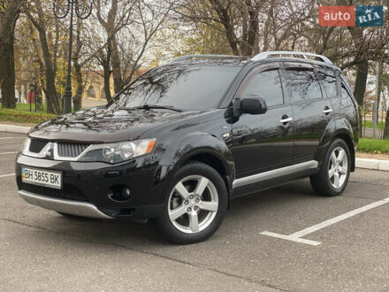 Черный Мицубиси Аутлендер ХЛ, объемом двигателя 3 л и пробегом 154 тыс. км за 8900 $, фото 1 на Automoto.ua
