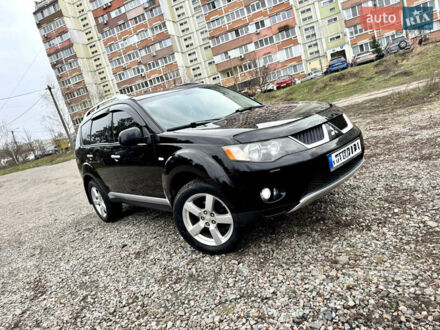 Чорний Міцубісі Аутлендер ХЛ, об'ємом двигуна 2.4 л та пробігом 229 тис. км за 9790 $, фото 1 на Automoto.ua