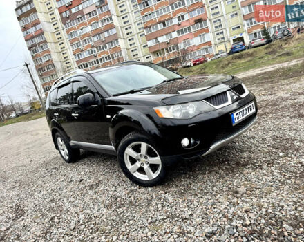 Черный Мицубиси Аутлендер ХЛ, объемом двигателя 2.4 л и пробегом 229 тыс. км за 9790 $, фото 1 на Automoto.ua