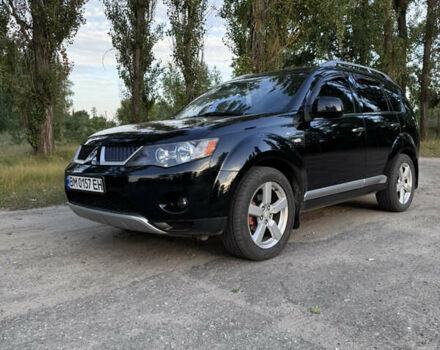 Чорний Міцубісі Аутлендер ХЛ, об'ємом двигуна 2.36 л та пробігом 209 тис. км за 10000 $, фото 1 на Automoto.ua